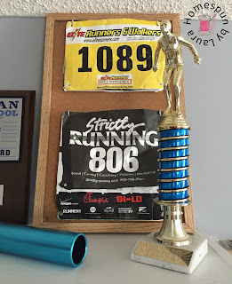  running medal athletic award display shelf and race bib bulletin board