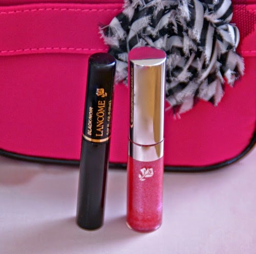 Lancome mascara and Pink sparkly lip gloss Lancome black mascara and pink sparkly lip gloss