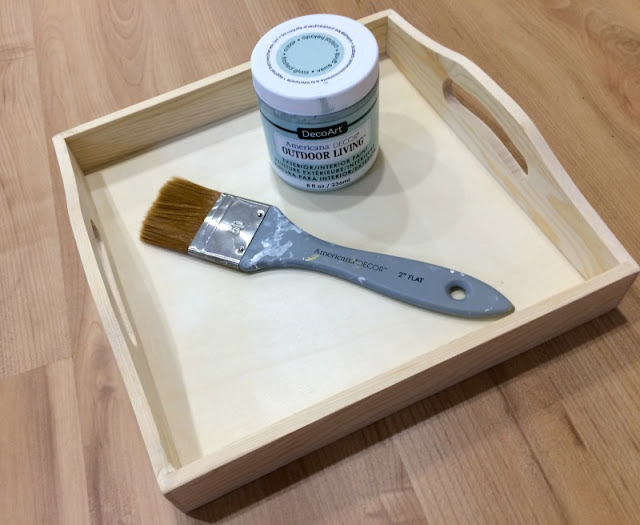 Make a plain wooden tray fancy with paint and holographic vinyl arrows using a Cricut.