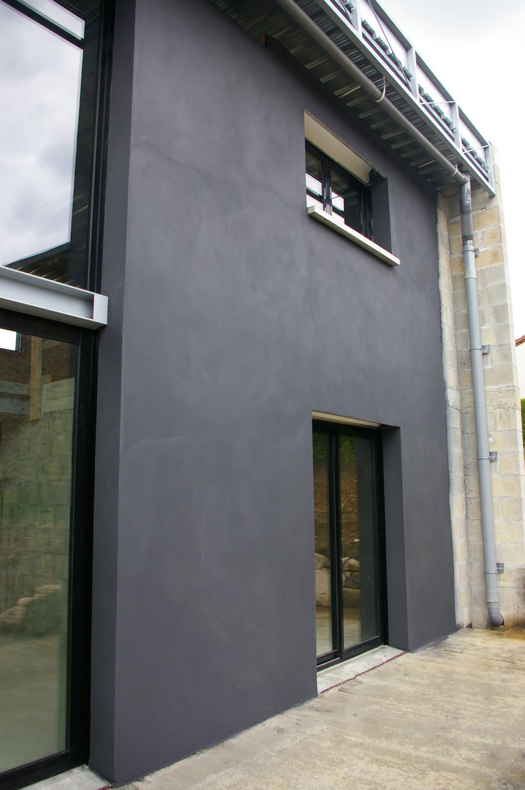 Maison "La Couture" Enduit taloché des deux façades.