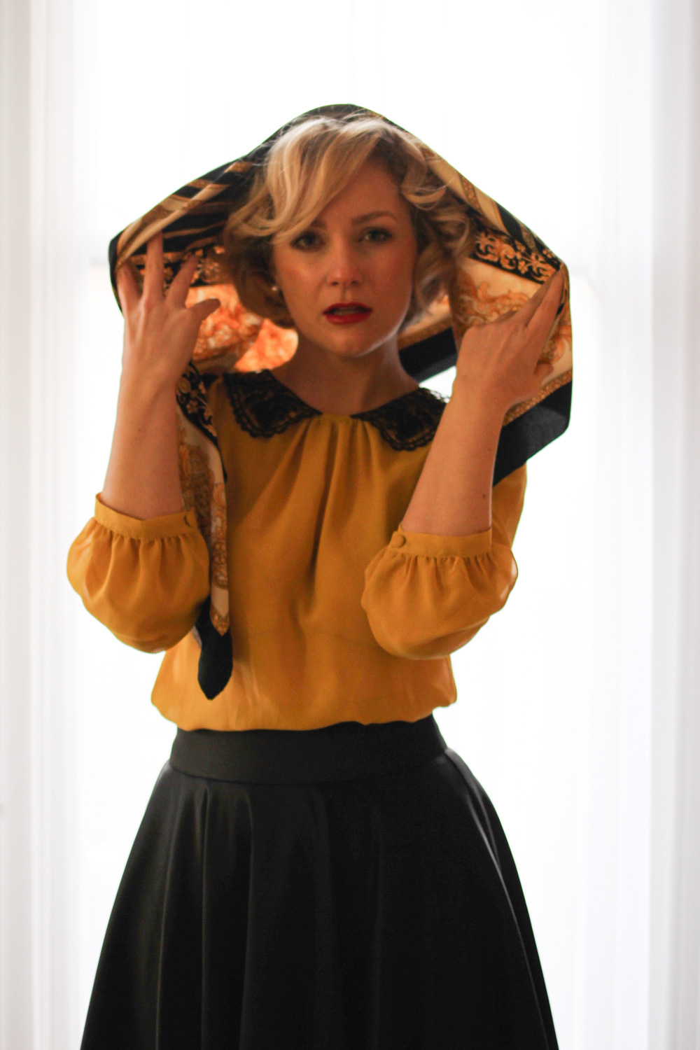 @findingfemme in yellow blouse with black lace collar, black Review Australia skirt, black bow heels and classic scarf.