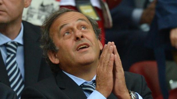 Platini-praying.jpg