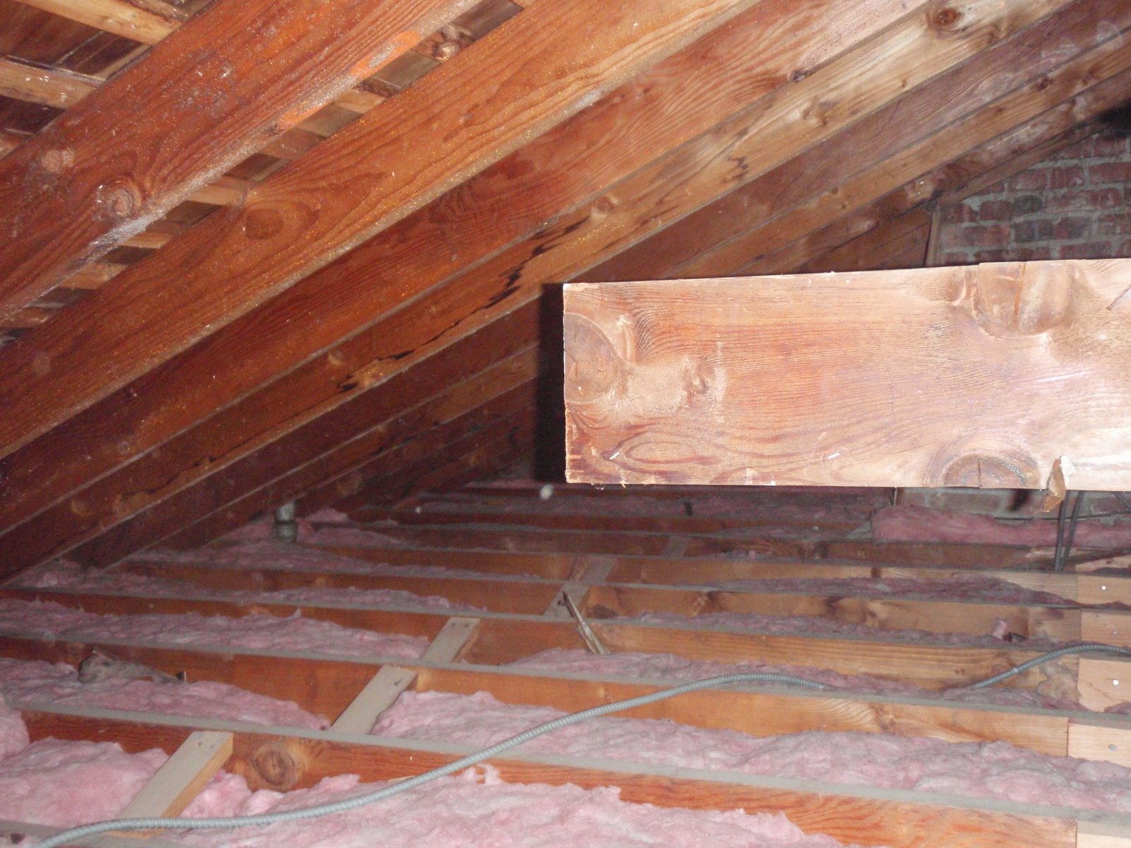 Home Pride Contracting Installing plywood in an attic