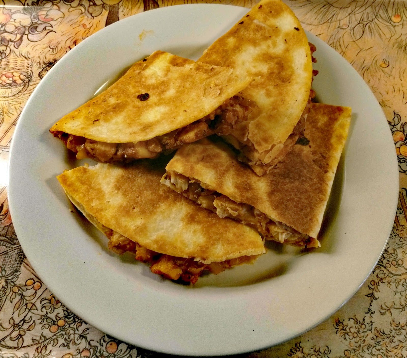 The Flaming Potato Fried tortilla bread with chicken stuffing