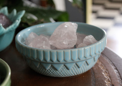 pink quartz in a blue bowl