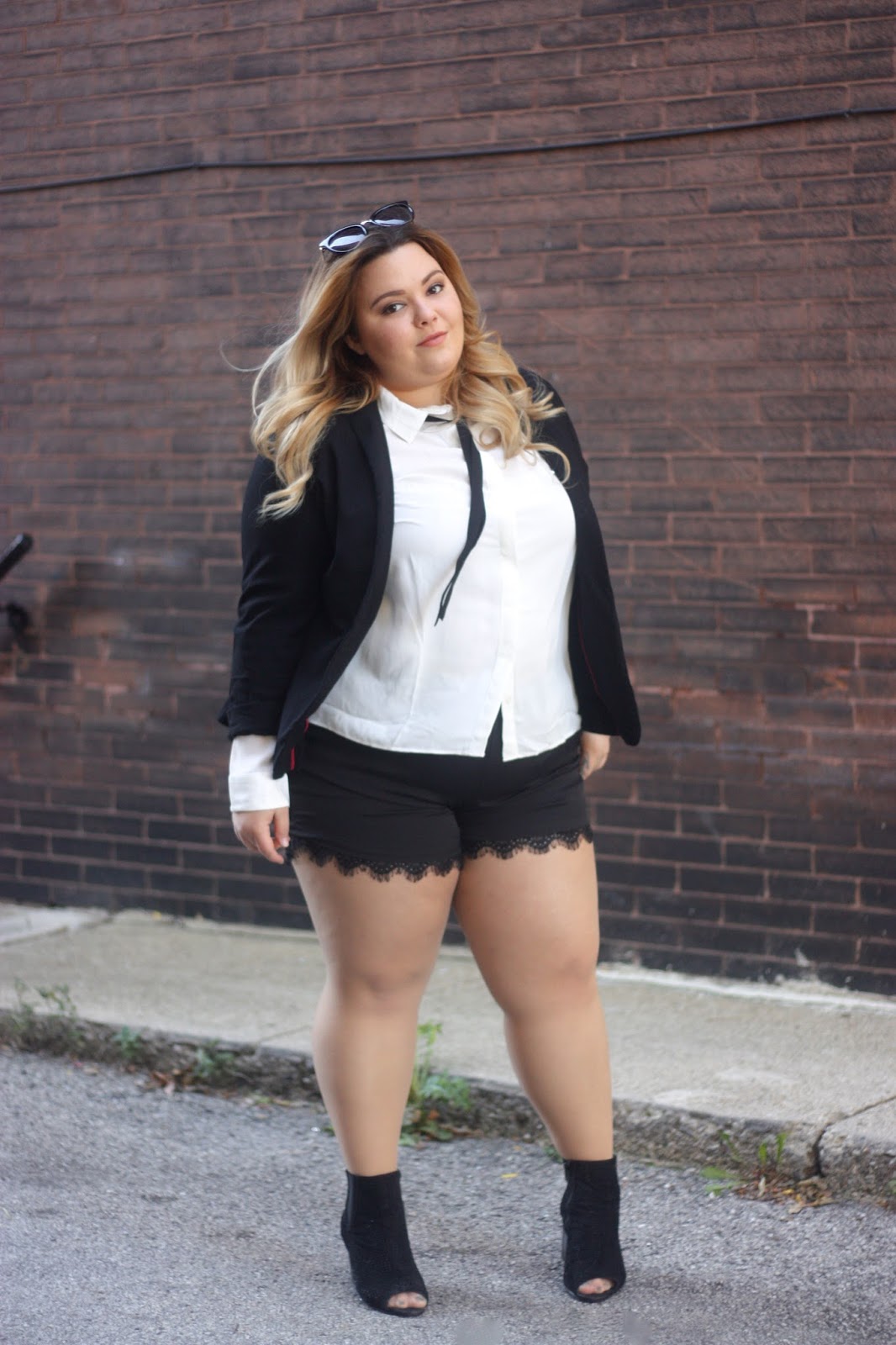 natalie craig, natalie in the city, curvy girl fashion, bow tie blouse, suzy shier, canada fashion, plus size lace shorts, plus size fashion, chicago blogger, midwest blogger, natalieinthecoty.com, plus size blazer, open toed perforated booties, karl lagerfeld, college fashion week, fatshion