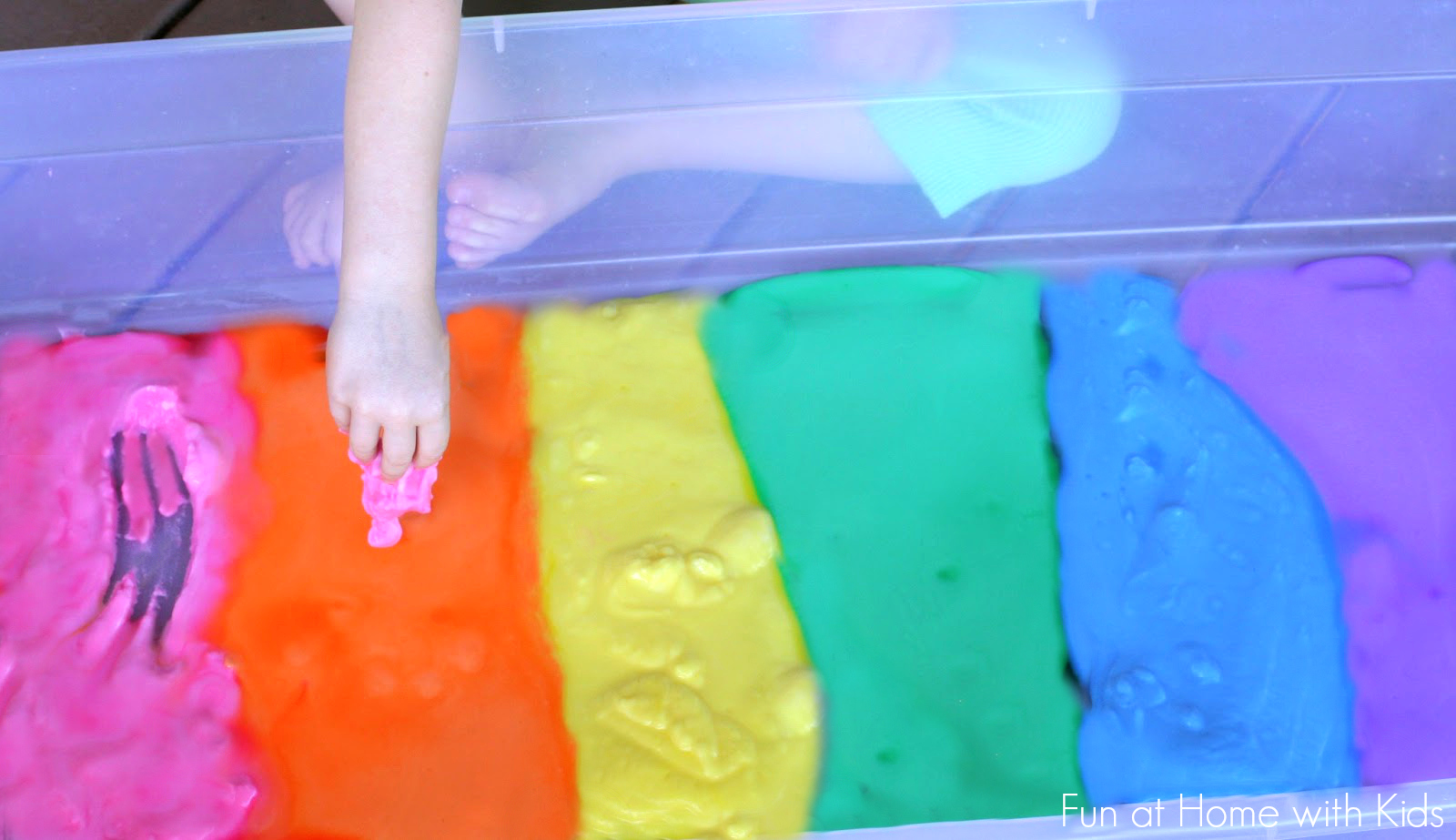 Fizzy Rainbow Slush - a beautiful sensory experience from Fun at Home with Kids
