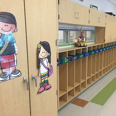 Students use baskets as mailboxes to organize their paperwork to send home each day.