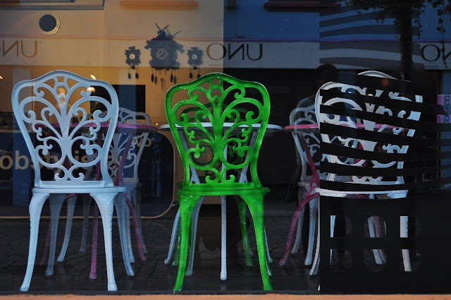 Ovre Holmegate colorful street stavanger norway chairs