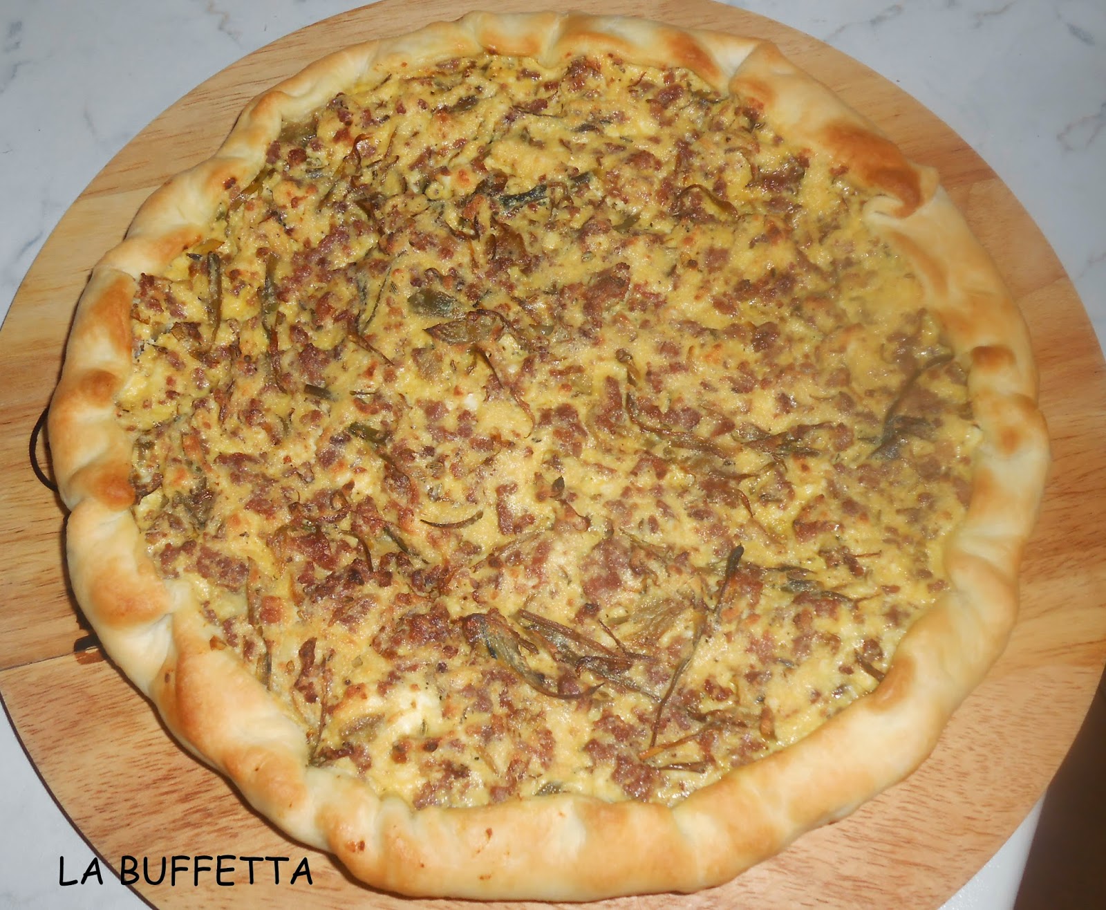 torta salata carciofi e salsiccia