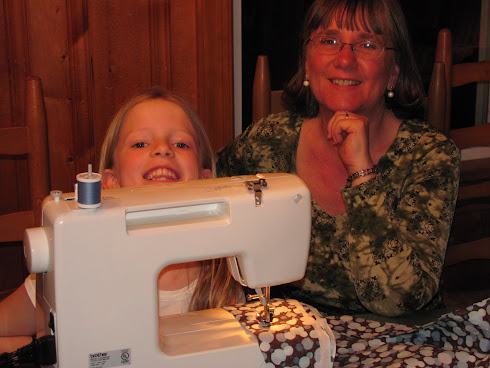 clare is doing her sewing project for 4H fair