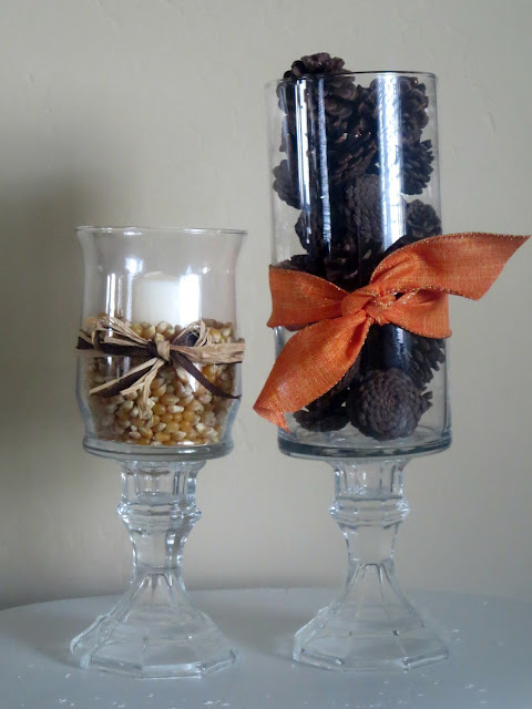 DIY Dollar Store Hurricane Vases--Use dollar store glass vases and candlesticks to make these inexpensive hurricane vases!