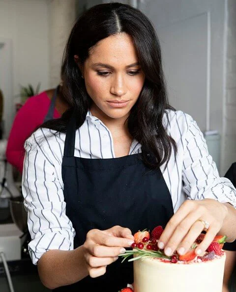 Meghan Markle wore WNU shirt, J.Crew Juliette blazer, Adina Reyter three diamond earrings, Adidas Stan Smith sneakers