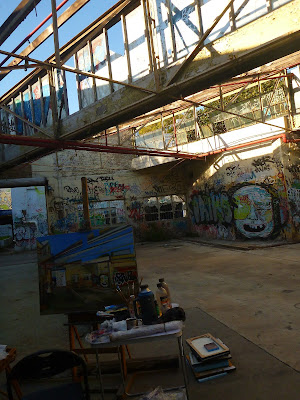 Plein air oil painting in the abandoned Dunlop-Slazenger factory by industrial heritage artist Jane Bennett