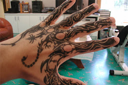 tattoo designs for back hand Charming back hand tattoo design 2012