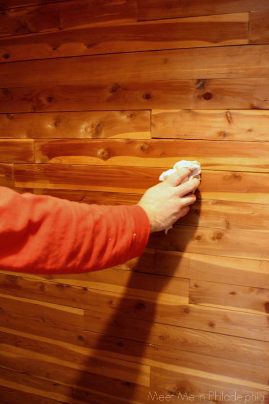 Wiping cedar walls in cedar closet via Meet Me in Philadelphia