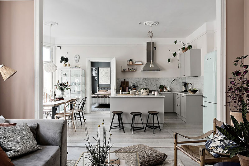 An attractive Scandinavian apartment with a charming color palette