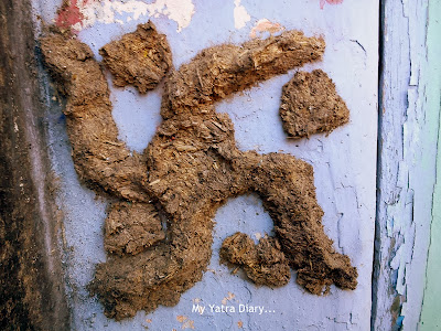 Raksha Bandhan celebration - Swastika Sooun made of cow dung