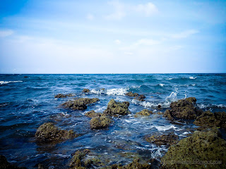 Rocky Coral Reefs Beach View At The Village At Umeanyar Beach, North Bali, Indonesia