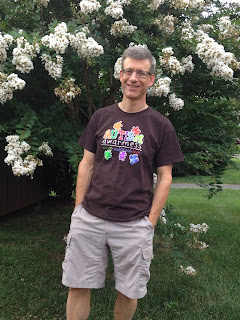 man wearing autism awareness t-shirt