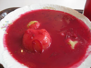 Borscht soup with sour cream and potatoes