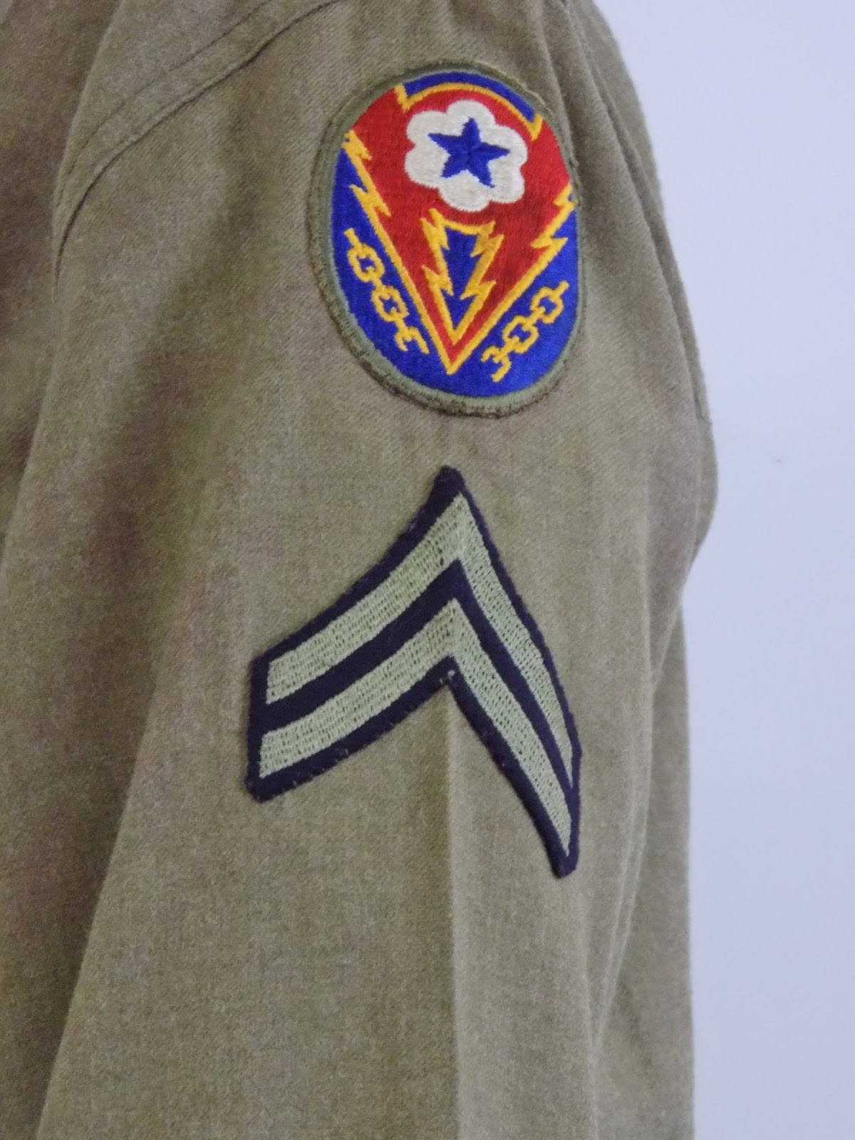 Lawrence Lore: Corp US Army uniform with ADSEC and 1st Inf Patches