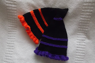 http://www.craftsy.com/pattern/knitting/accessory/halloween-witches-baby-hat/146399