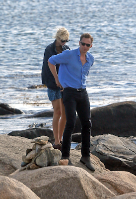 1a14 Photos: Taylor Swift who recently broke up with ex Calvin Harris is seen kissing Tom Hiddleston