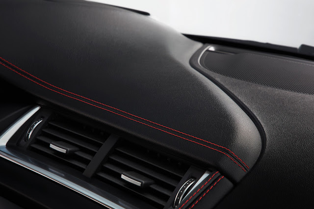 That interior chicane curve recalls the sporty pedigree of the Jaguar E-PACE.