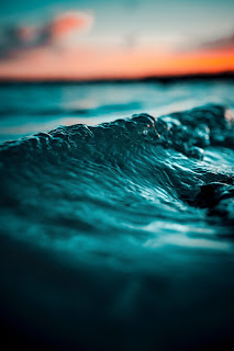 Dark waves of the ocean. Rolling waves in the sea