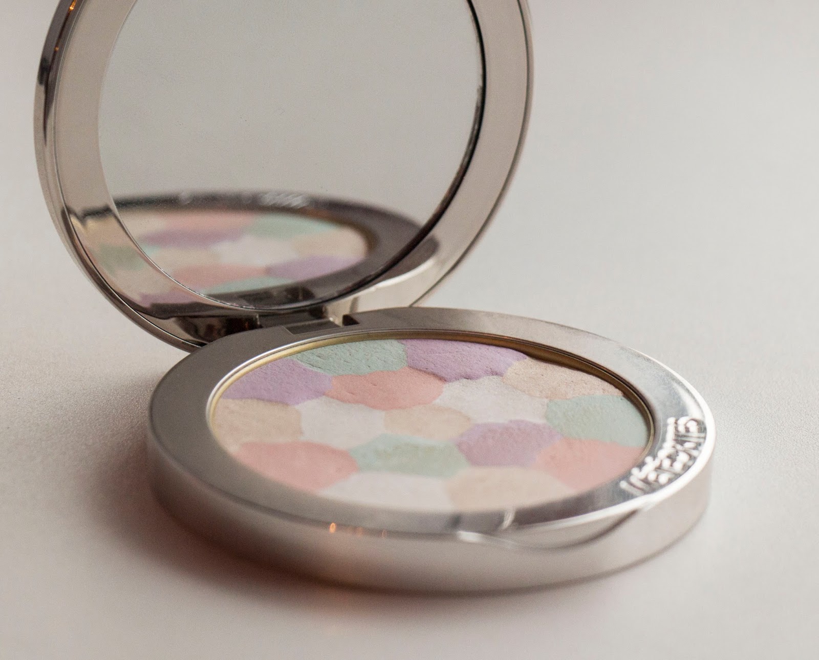 Палетка герлен метеориты. Герлен метеориты компакт свотчи. Герлен метеориты 1987. Хайлайтер guerlain meteorites. Коллекция метеоритов герлен.