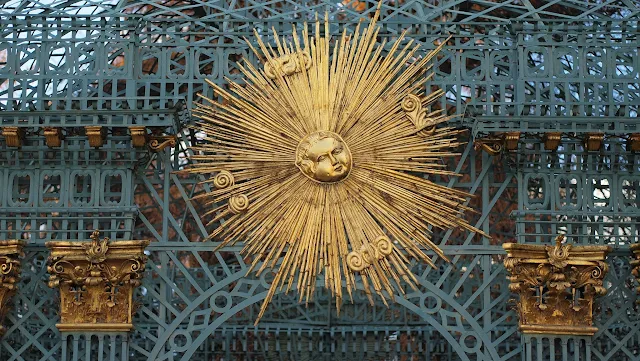 Golden sunburst sculpture at Sans Souci in Potsdam, Germany