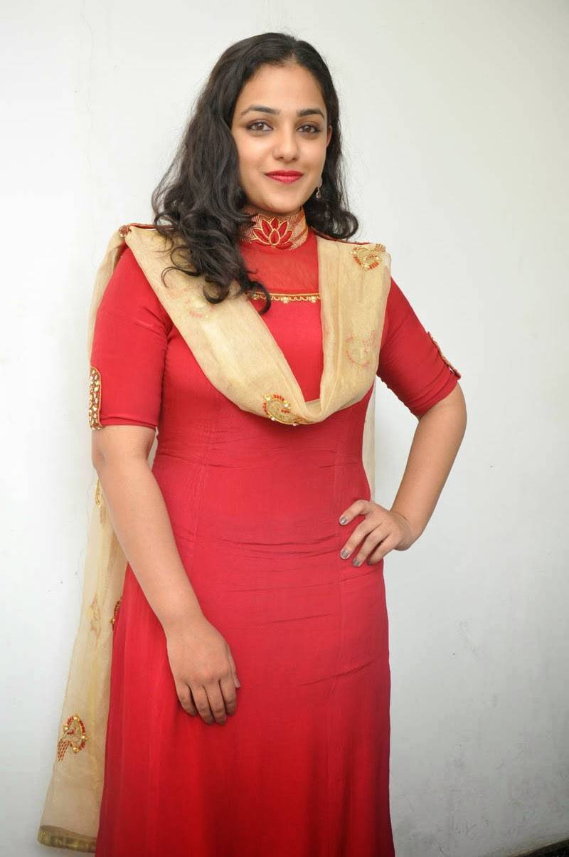 Actress Nithya Menen Hot Photos At Movie Interview In Red Dress