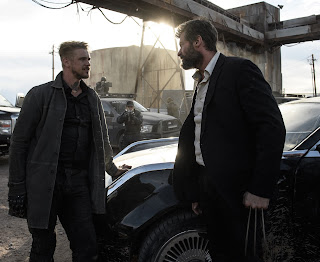 Hugh Jackman as Logan and Boyd Holbrook in Logan