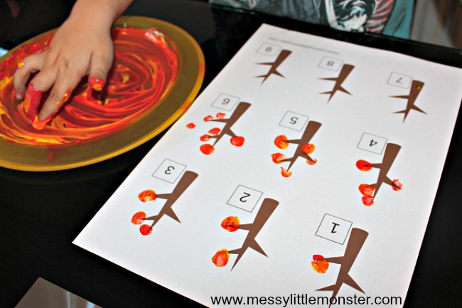An Autumn/ Fall fingerprint counting activity for kids. Download our free falling leaf printable to help preschoolers work on counting skills and number recognition.