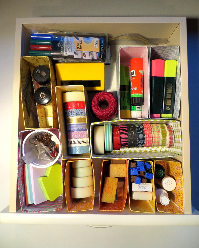 recycling old boxes into drawer dividers