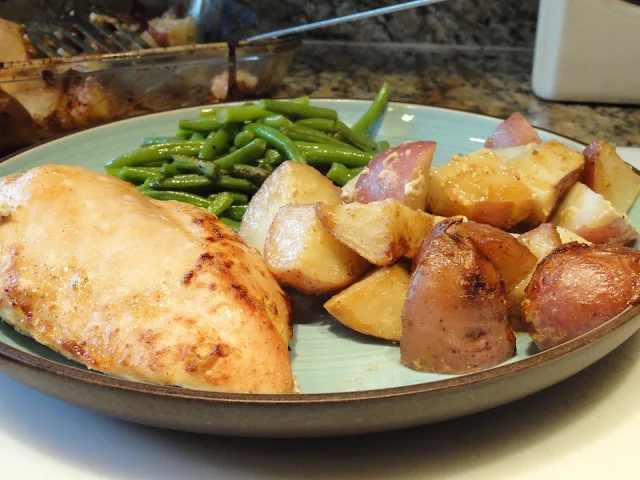 Baked Chicken in one pan with red potatoes is a favorite easy dinner recipe.
