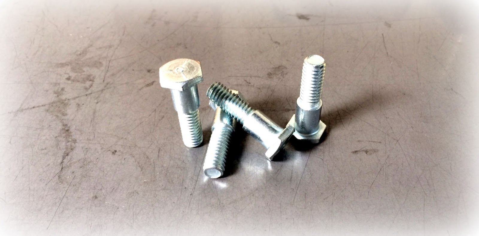 Excellence In Custom Fasteners & Hardware Special Grade 5 Hex Head Shoulder Bolt