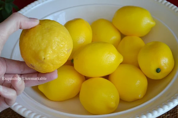 Faux Lemons As Decor in a white bowl