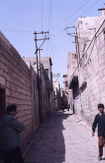 stone streets between the walls of houses in urfa
