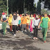 Tingkatkan Keharmonisan,Yonif Para Raider 503 Kostrad Gelar Jalan Santai Prajurit dan Persit
