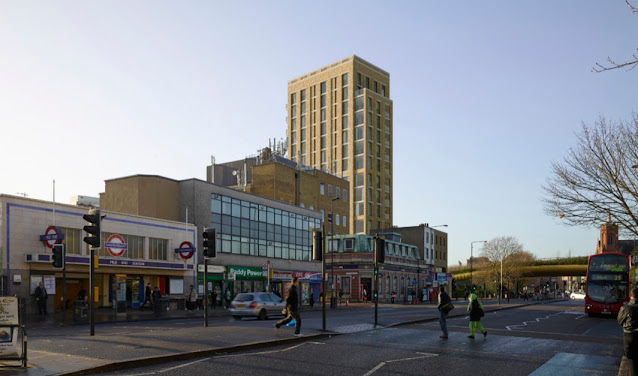 An artists impression of the proposed 15-storey block of flats as seen looking west towards the Green Bridge from opposite Mile End Station
