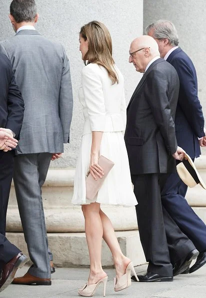 Queen Letizia wore BOSS HUGO BOSS Jeisana Textured Peplum Jacket. Felipe Varela clutch bag and Magrit sandals