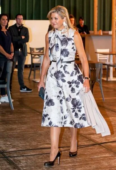 Queen Maxima's print dress is by Belgian fashion house Natan, Prada earrings. LK Bennett sledge patent leather platform heel pumps