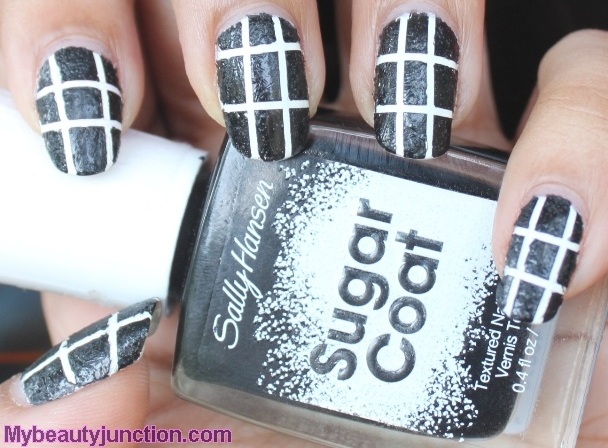 Textured black and white nail art with Sally Hansen Sugar Coat nail polish 