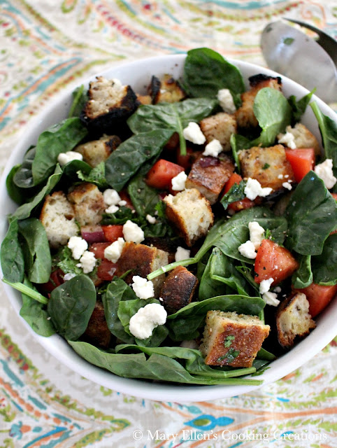 Cripsy, charred grilled bread for grilled bread salad with spinach, tomatoes and blue cheese. The perfect summer salad. Great for entertaining. #salad #grilledbread #panzanella