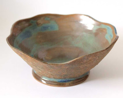 wavy edged carved clay bowl