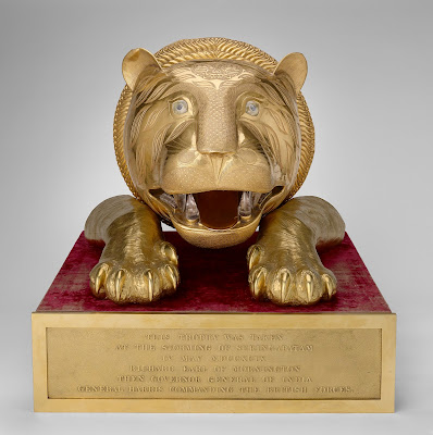 tiger-head and paws from the base of Tipu Sultan's throne tiger-head-and-paws-from-tipu-sultan's-throne