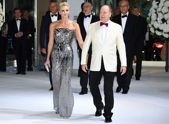 Princess Charlene wore Strapless Silver Sequin jumpsuit at Monaco Red Cross Ball Gala in Monte-Carlo