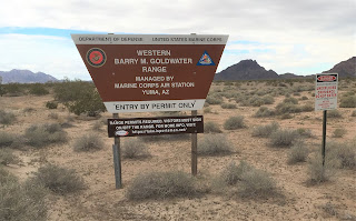 Sign announces the boundary of Barry M Goldwater Range- West